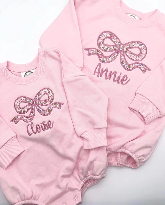 Personalized Bow Appliqué Sweatshirt bubble romper for Baby Toddler Girl | Floral Fabric, cute custom outfit, Bows, Pink, Purple, Customize